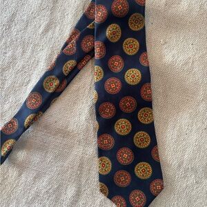 Burberry Navy Tie with Red and Gold Medallions